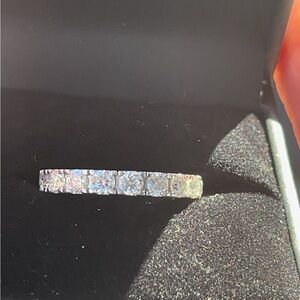 Moissanite sterling silver eternity band
